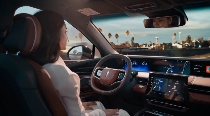 A person is shown driving hands-free on the highway with available Lincoln BlueCruise technology. | Gary Yeomans Lincoln Ocala in Ocala FL