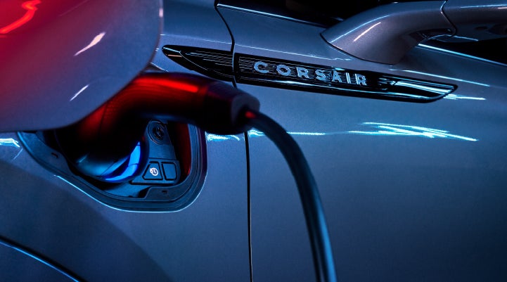 A charger plugged into the charging port of a 2024 Lincoln Corsair® Plug-in Hybrid model. | Gary Yeomans Lincoln Ocala in Ocala FL